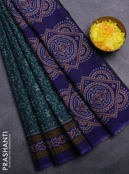 Muslin cotton saree peacock green and blue with allover ikat prints and printed border