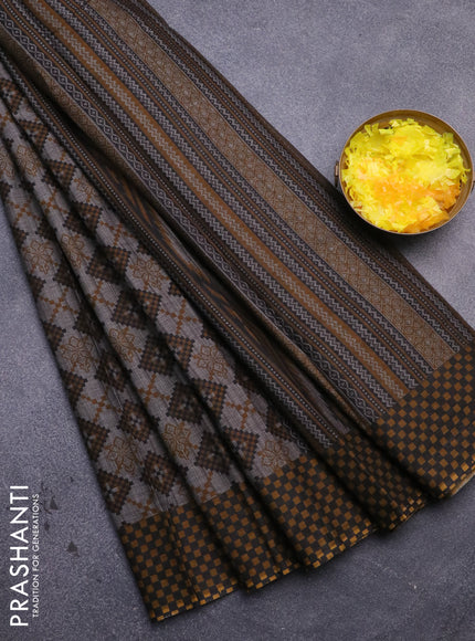 Muslin cotton saree grey and mustard with allover ikat prints and printed border