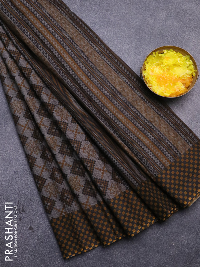 Muslin cotton saree grey and mustard with allover ikat prints and printed border