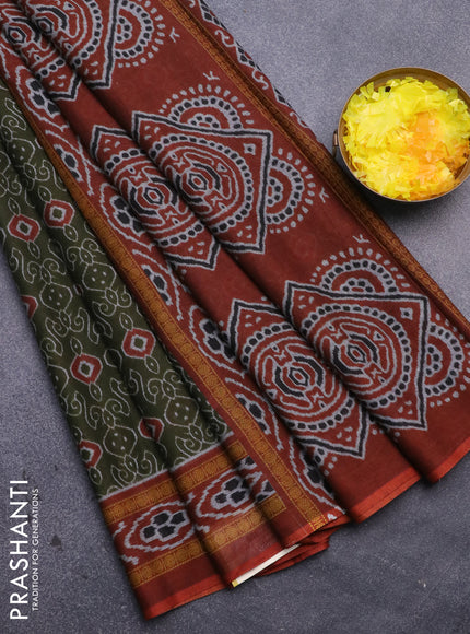 Muslin cotton saree sap green and rust shade with allover prints and printed border