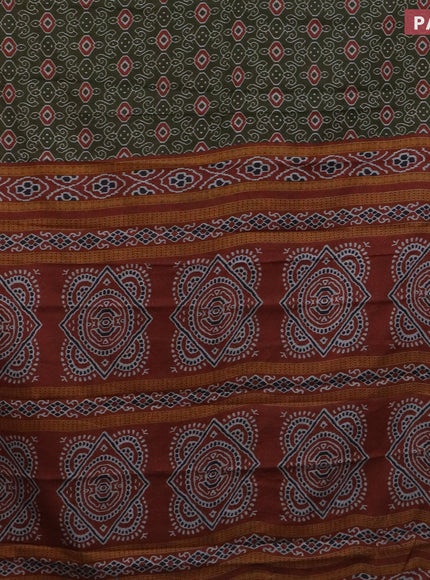 Muslin cotton saree sap green and rust shade with allover prints and printed border