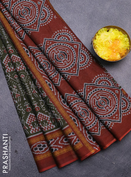 Muslin cotton saree sap green and rust shade with allover ikat prints and printed border