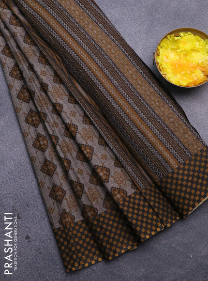 Muslin cotton saree grey and mustard shade with allover ikat prints and printed border