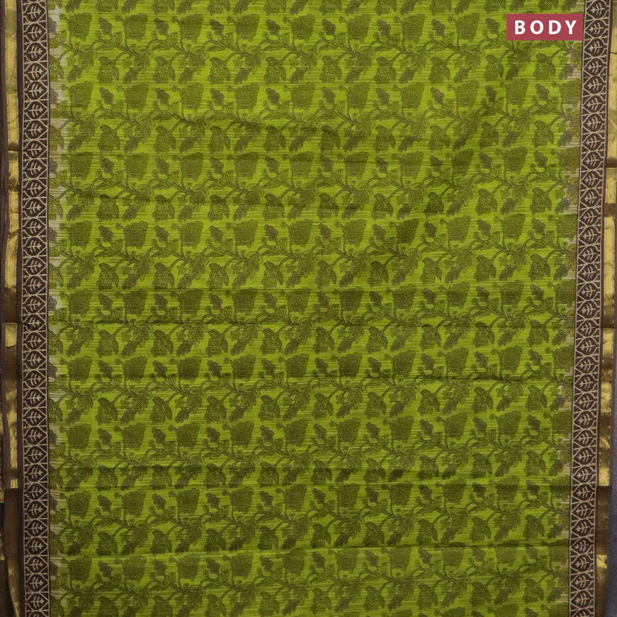 Muslin cotton saree light green and brown with allover prints and small zari woven border