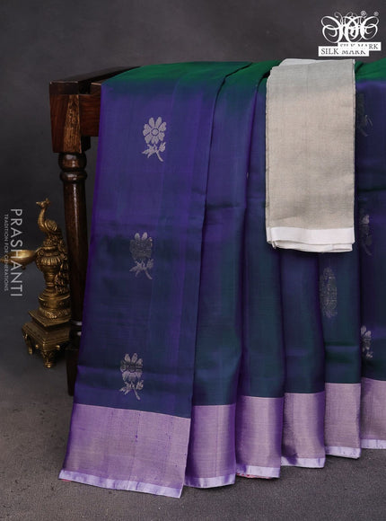 Pure uppada silk saree dual shade of bluish green with silver zari woven floral buttas and silver zari woven border