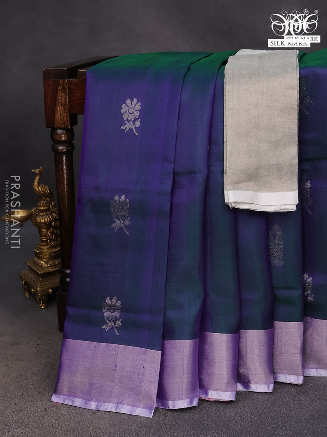 Pure uppada silk saree dual shade of bluish green with silver zari woven floral buttas and silver zari woven border