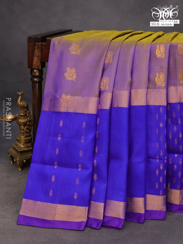 Pure uppada silk saree dual shade of bluish yellow and blue shade with allover zari woven buttas and long zari woven butta border