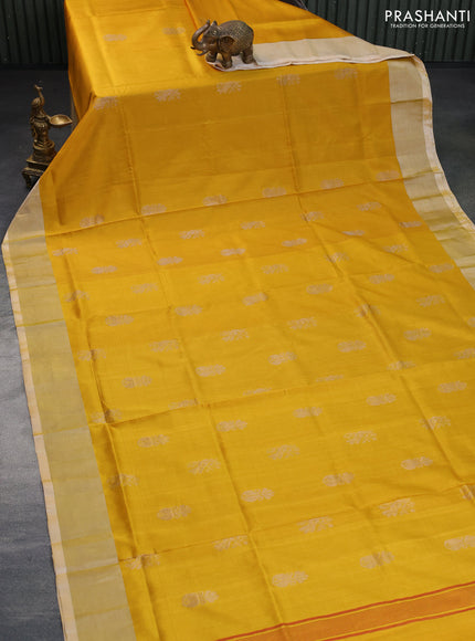 Pure uppada silk saree mustard yellow with silver zari woven buttas and silver zari woven border