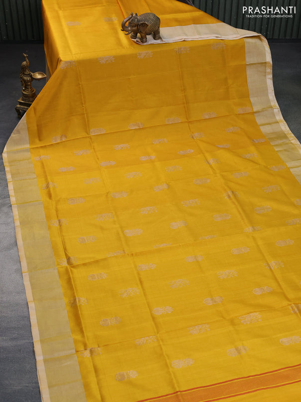 Pure uppada silk saree mustard yellow with silver zari woven buttas and silver zari woven border