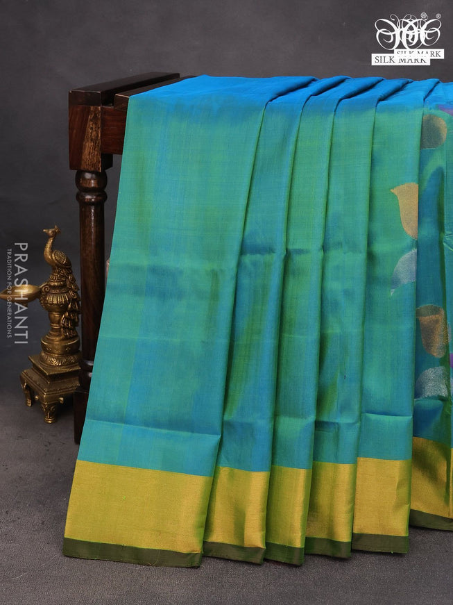 Pure uppada silk saree dual shade of teal blue and brown with zari woven jamdhani buttas and zari woven border