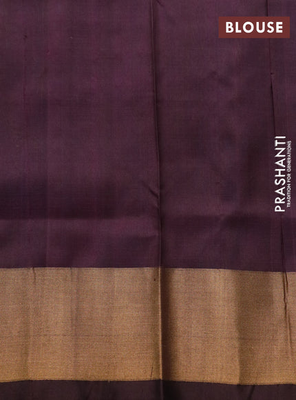 Pure uppada silk saree dual shade of teal blue and brown with zari woven jamdhani buttas and zari woven border