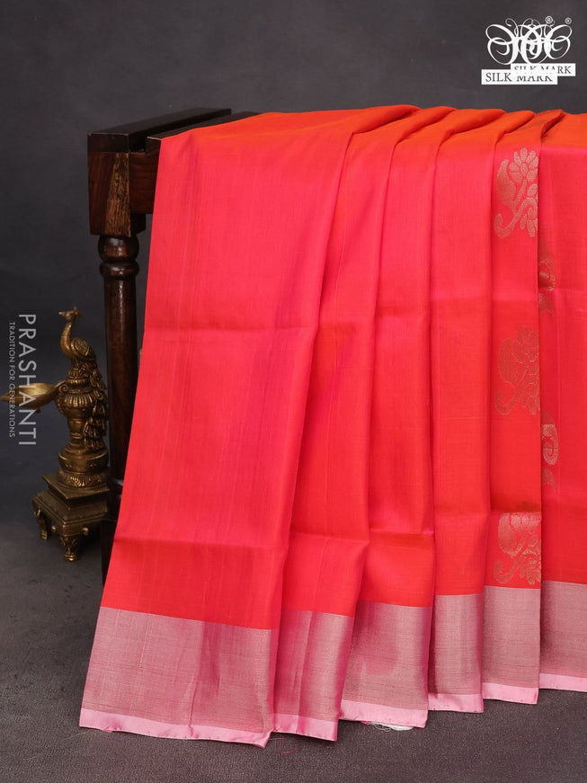 Pure uppada silk saree dual shade of pinkish orange with silver zari woven buttas and silver zari woven border