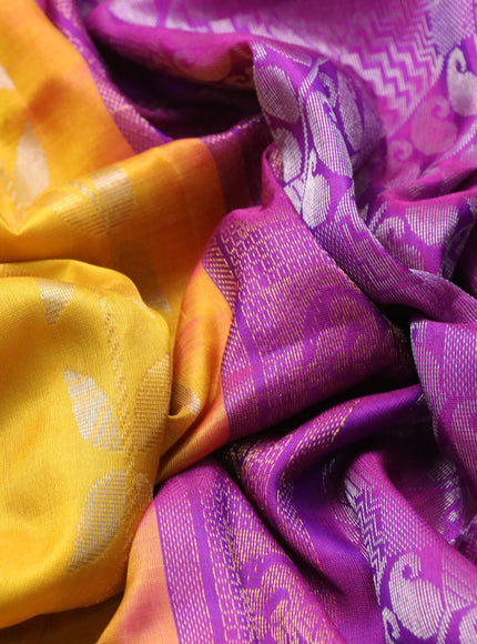 Pure uppada silk saree yellow and purple with allover zari weaves & buttas and zari woven border