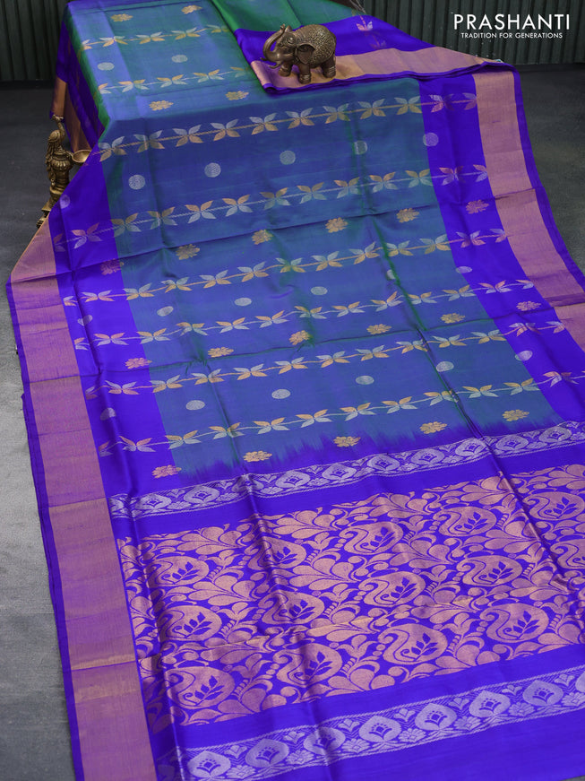 Pure uppada silk saree dual shade of bluish green and blue with allover zari weaves and zari woven border