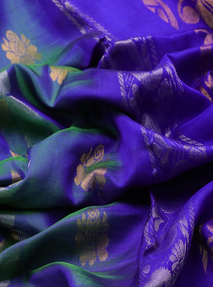 Pure uppada silk saree dual shade of bluish green and blue with allover zari weaves and zari woven border