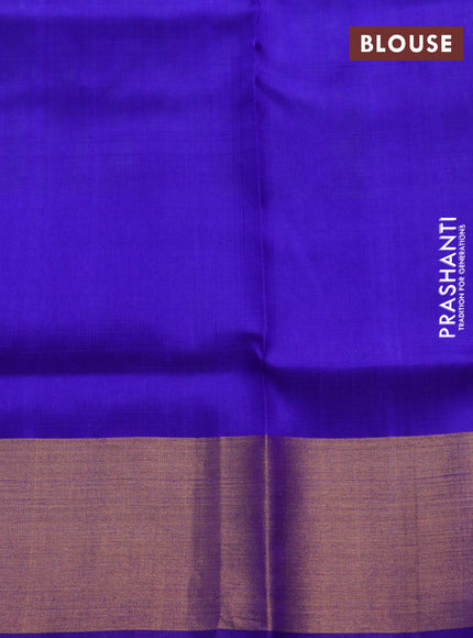 Pure uppada silk saree dual shade of bluish green and blue with allover zari weaves and zari woven border