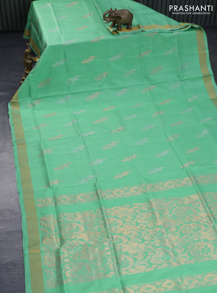 Pure uppada silk saree teal green shade with zari woven floral buttas and zari woven border