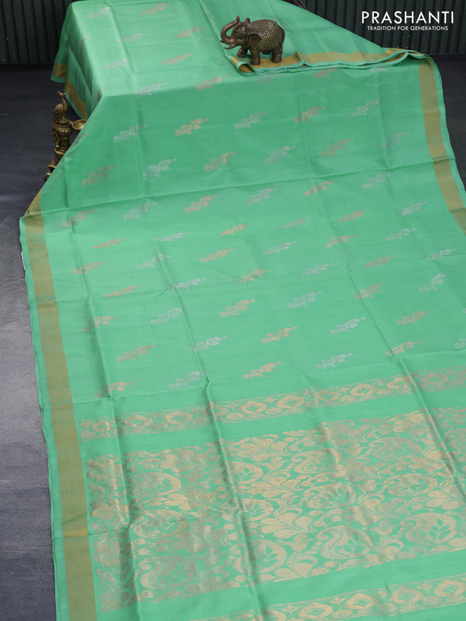 Pure uppada silk saree teal green shade with zari woven floral buttas and zari woven border