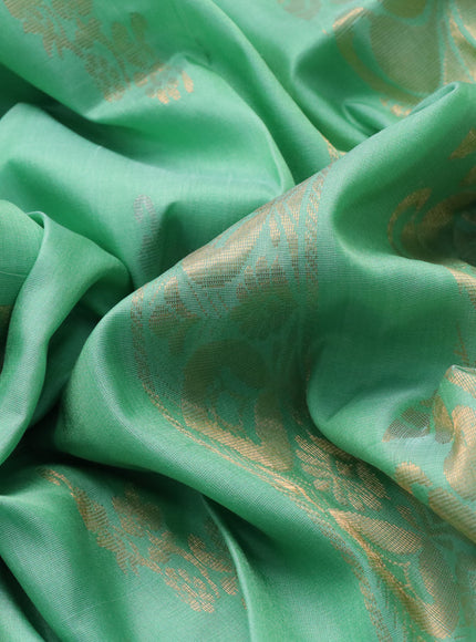 Pure uppada silk saree teal green shade with zari woven floral buttas and zari woven border