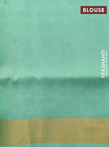 Pure uppada silk saree teal green shade with zari woven floral buttas and zari woven border