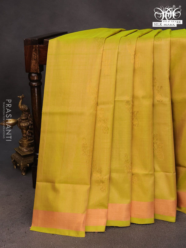 Pure uppada silk saree dual shade of lime green and coffee brown with zari woven floral buttas and zari woven border