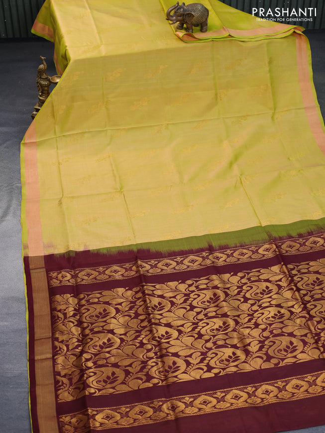 Pure uppada silk saree dual shade of lime green and coffee brown with zari woven floral buttas and zari woven border