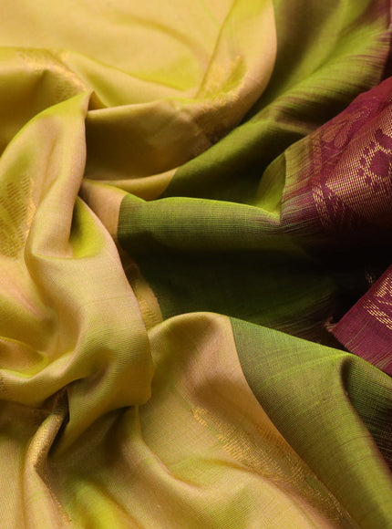 Pure uppada silk saree dual shade of lime green and coffee brown with zari woven floral buttas and zari woven border