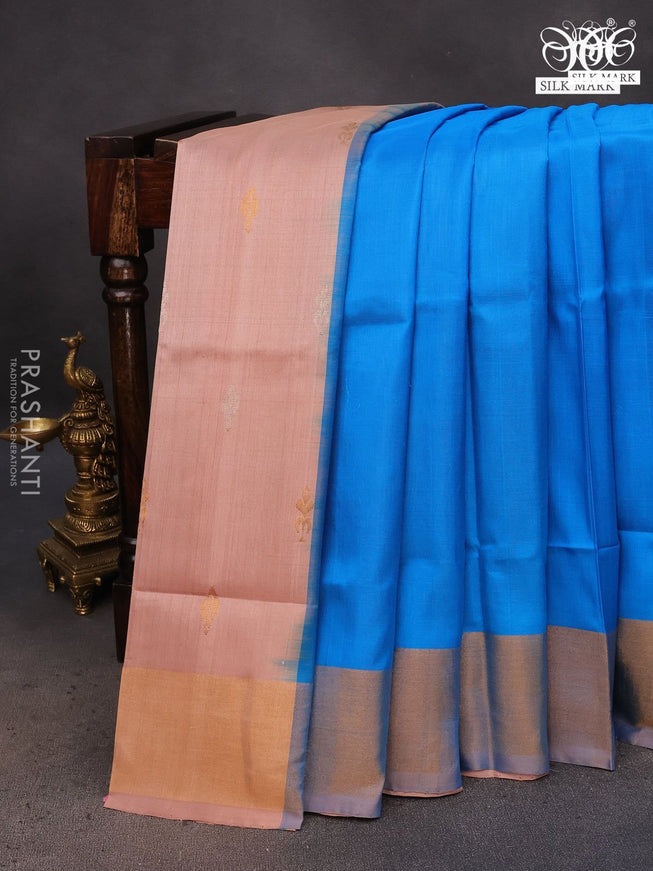 Pure uppada partly silk saree cs blue and pastel brown with plain body and zari woven border