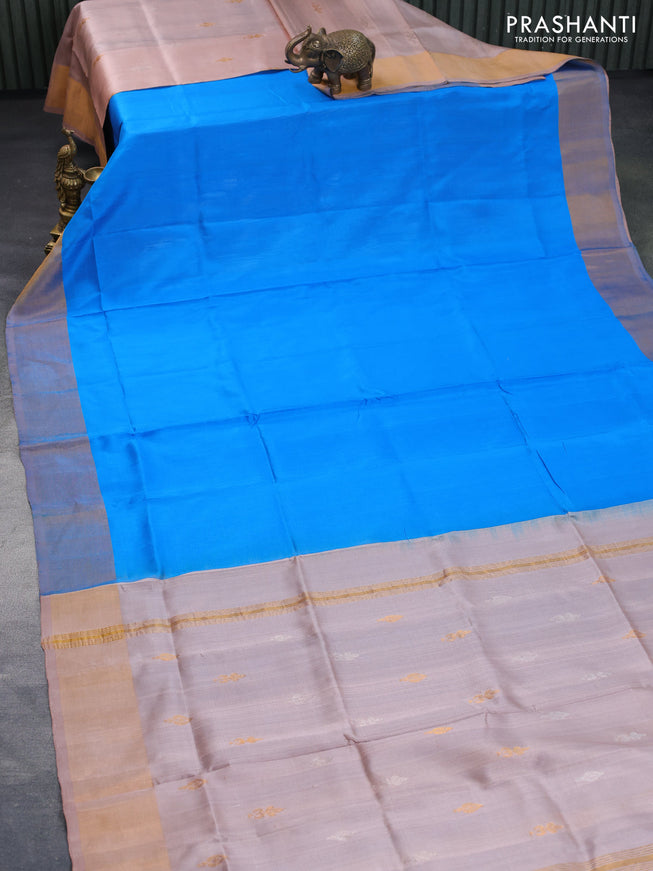 Pure uppada partly silk saree cs blue and pastel brown with plain body and zari woven border