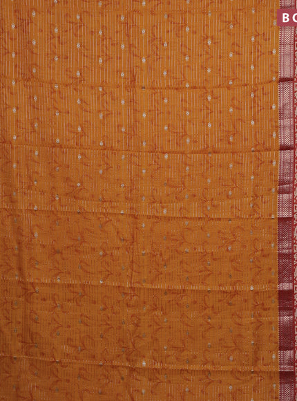 Assam silk saree mustard yellow and rust shade with allover zari weaves and rettapet zari woven batik printed border