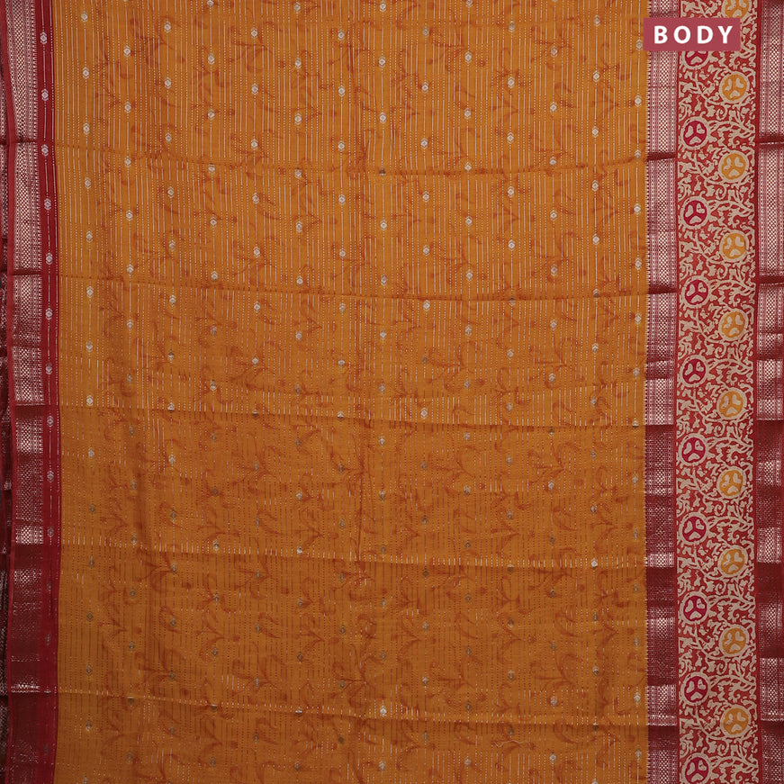 Assam silk saree mustard yellow and rust shade with allover zari weaves and rettapet zari woven batik printed border