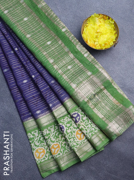 Assam silk saree blue and green with allover zari weaves and rettapet zari woven batik printed border