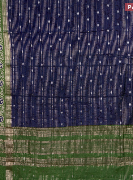 Assam silk saree blue and green with allover zari weaves and rettapet zari woven batik printed border