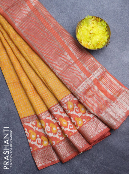 Assam silk saree mango yellow and orange with allover zari checked pattern and rettapet zari woven ikat printed border