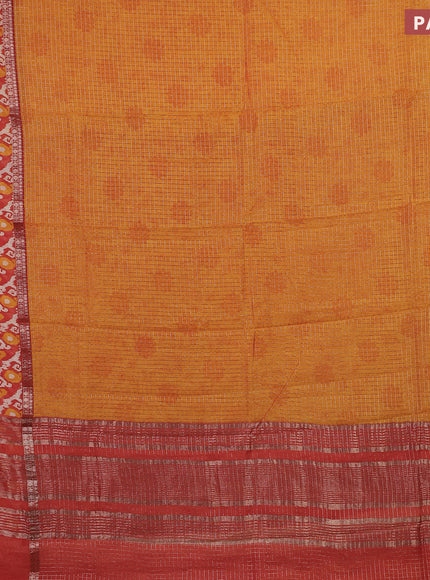 Assam silk saree mango yellow and orange with allover zari checked pattern and rettapet zari woven ikat printed border