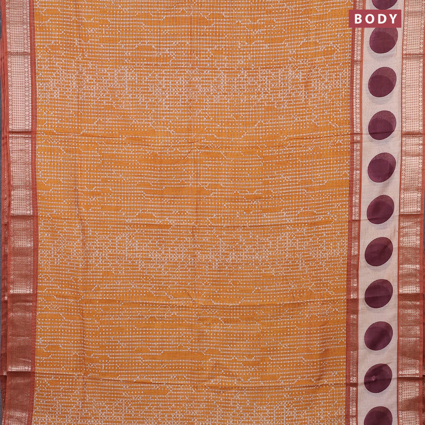 Assam silk saree mustard yellow and rust shade with allover zari checked pattern & prints and rettapet zari woven printed border