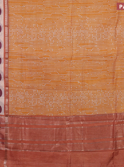 Assam silk saree mustard yellow and rust shade with allover zari checked pattern & prints and rettapet zari woven printed border