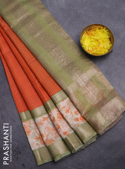 Assam silk saree orange and pastel green shade with allover zari checked pattern and rettapet zari woven ikat printed border