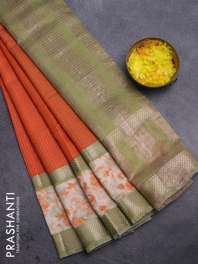 Assam silk saree orange and pastel green shade with allover zari checked pattern and rettapet zari woven ikat printed border