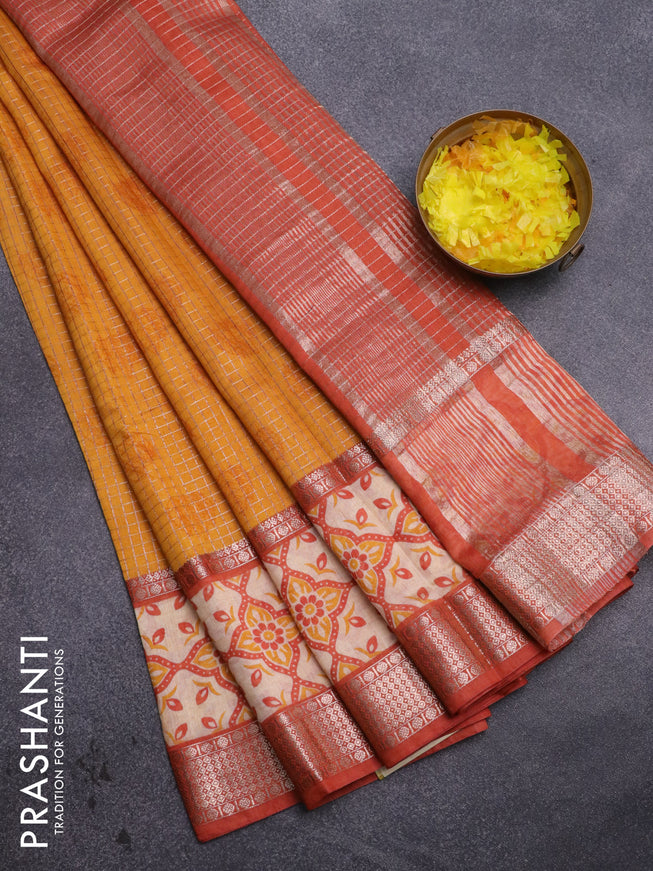 Assam silk saree mango yellow and rust shade with allover zari checked pattern and rettapet zari woven printed border