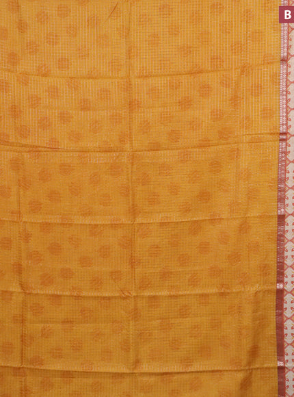 Assam silk saree mango yellow and rust shade with allover zari checked pattern and rettapet zari woven printed border