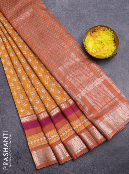 Assam silk saree mustard yellow and orange with allover zari checked pattern & prints and rettapet zari woven printed border