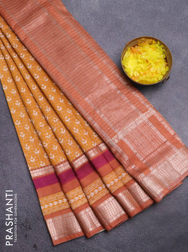 Assam silk saree mustard yellow and orange with allover zari checked pattern & prints and rettapet zari woven printed border