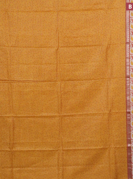 Assam silk saree mango yellow and rust shade with allover zari checked pattern and rettapet zari woven printed border