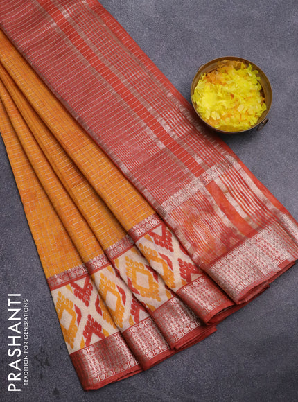 Assam silk saree mango yellow and rust shade with allover zari checked pattern and rettapet zari woven ikat printed border