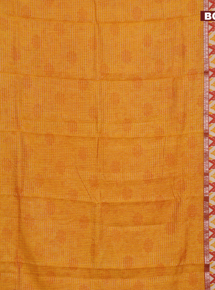 Assam silk saree mango yellow and rust shade with allover zari checked pattern and rettapet zari woven ikat printed border