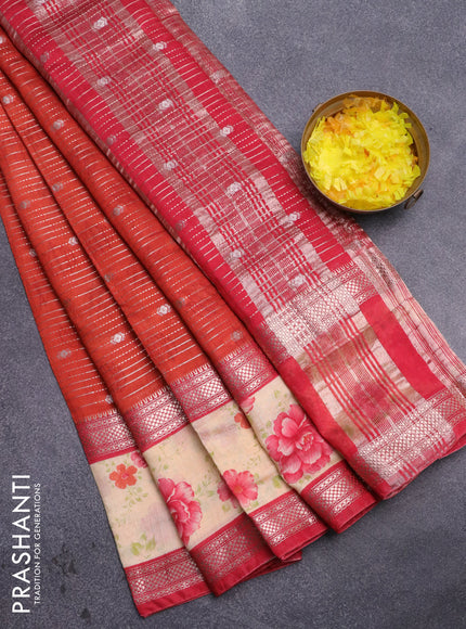 Assam silk saree orange and red shade with allover zari strips and rettapet zari woven floral printed border