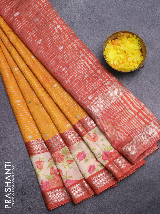 Assam silk saree mango yellow and orange with allover zari weaves and rettapet zari woven floral printed border