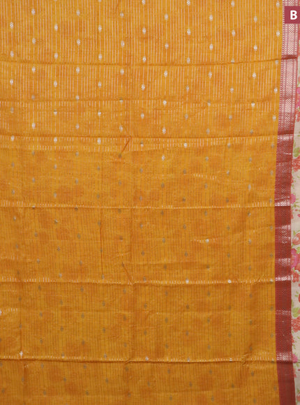 Assam silk saree mango yellow and orange with allover zari weaves and rettapet zari woven floral printed border