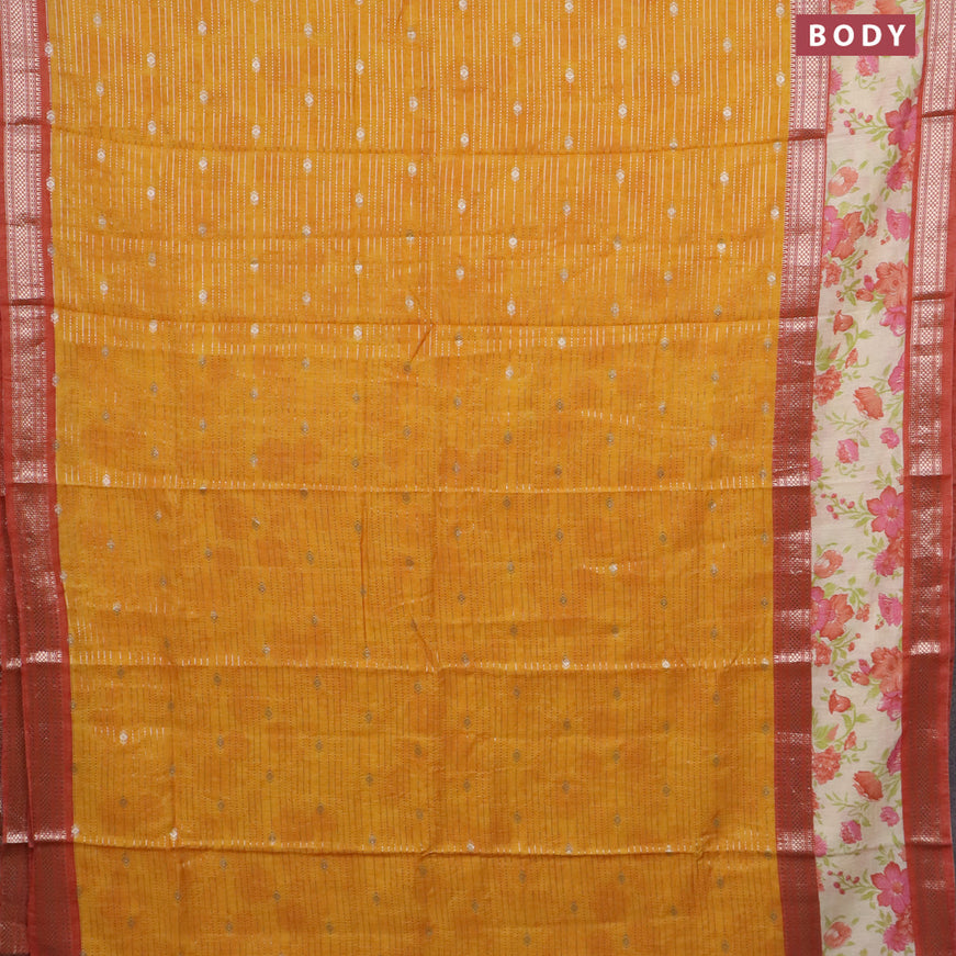 Assam silk saree mango yellow and orange with allover zari weaves and rettapet zari woven floral printed border